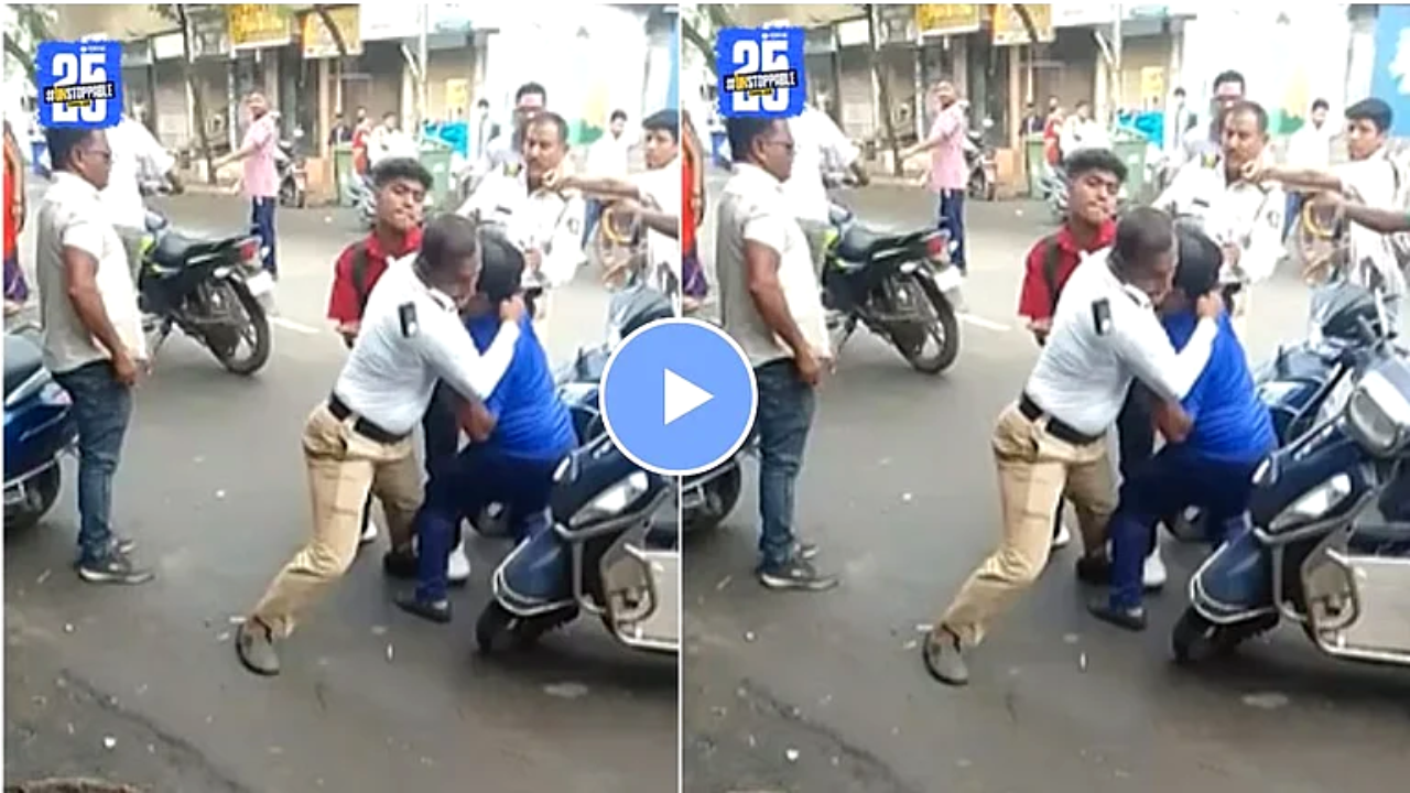 व्यस्त चौराहे पर पिता-पुत्र ने ट्रैफिक पुलिस को पीटा